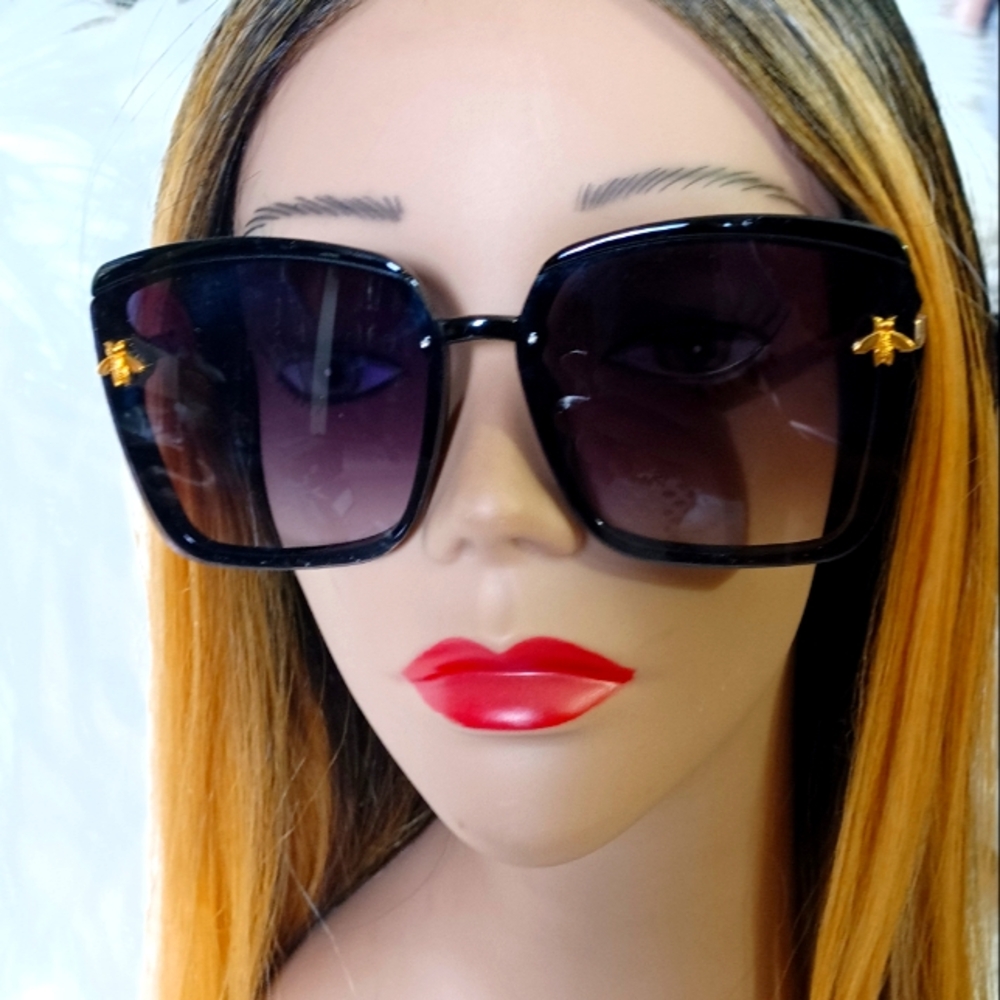 Elegant Black Sunglasses with Gold Accents